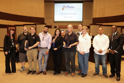 Emler Swim School team after being presented Best of Class Award from the City of Plano Environmental Health and Sustainability Department
