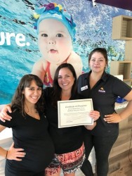 Three members of the Emler Round Rock school at the front desk